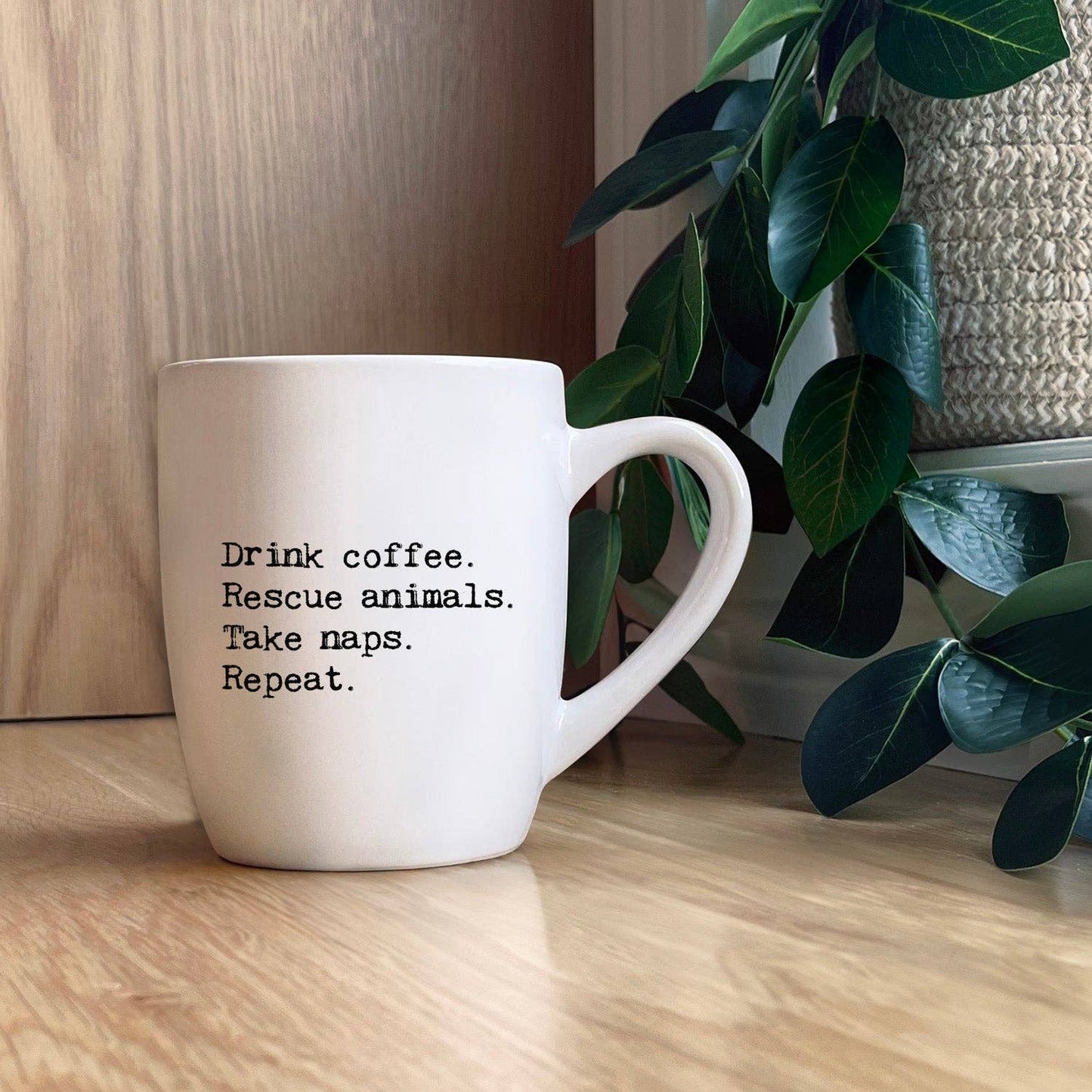 Drink coffee. Rescue animals. Take naps. Repeat. Mug