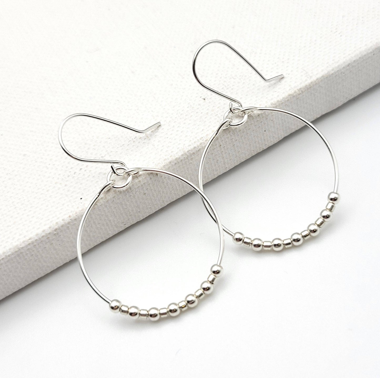 Silver Hoop Earrings with Silver Beads